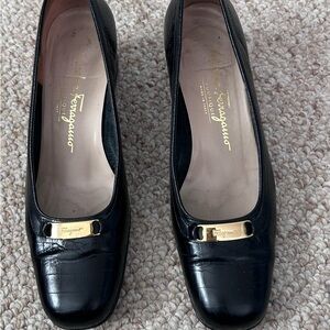 Salvatore Ferragamo Black Embossed Flats with Gold Detail